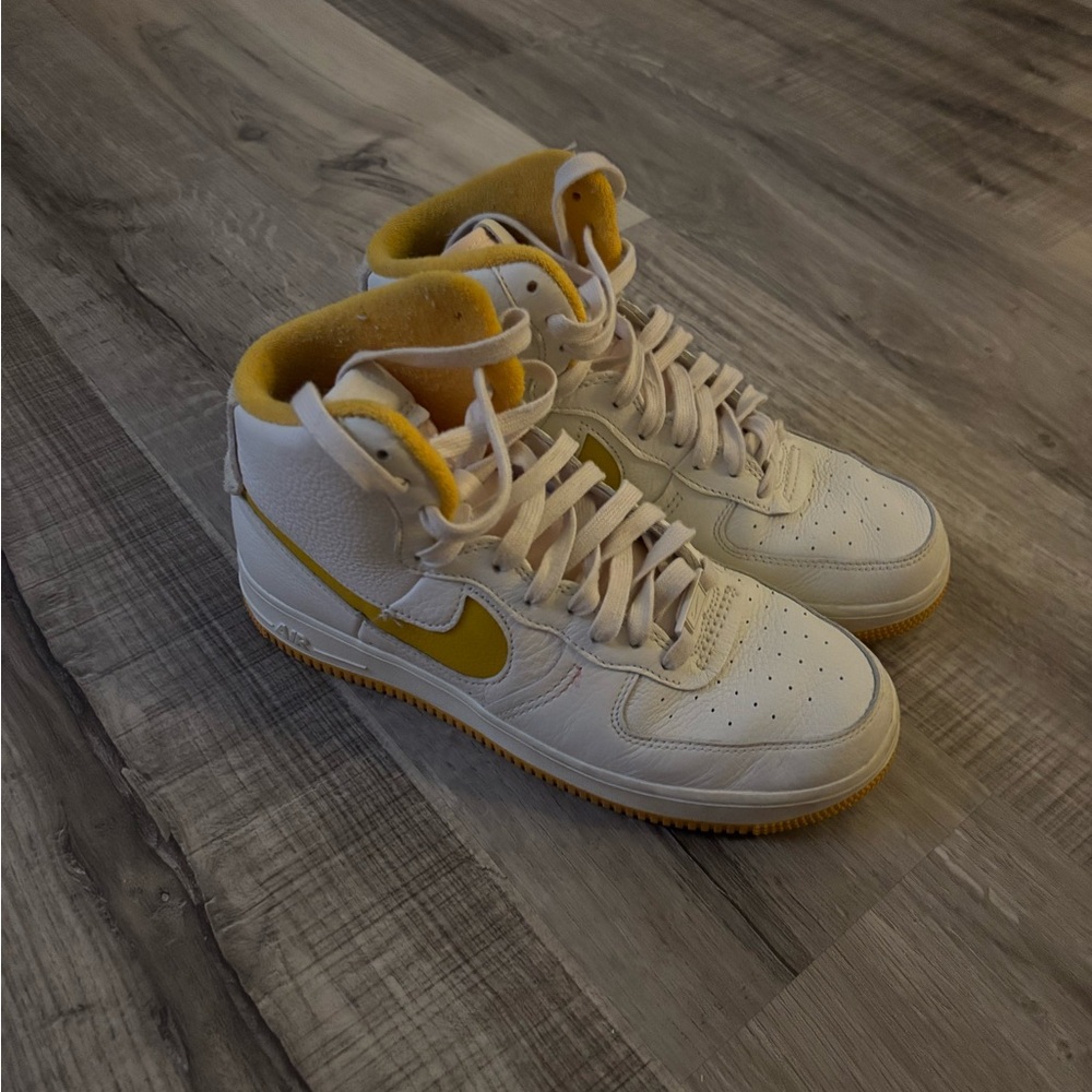 White and Yellow High-Top Sneakers